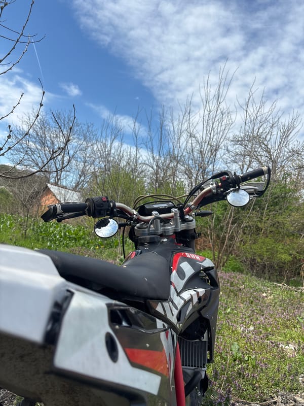 SWM motorcycle photographed in rural setting