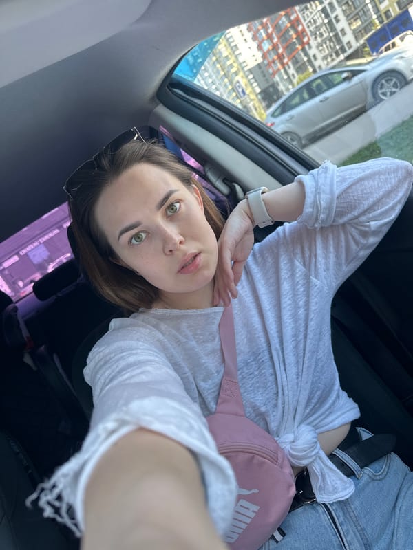Woman takes selfies in car and elevator in Perm