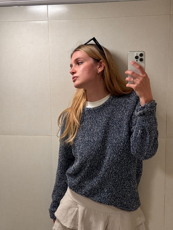 Woman documents day with selfies and park sculptures