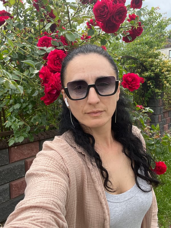 Woman documents blooming garden and countryside in Onokivtsi, Ukraine