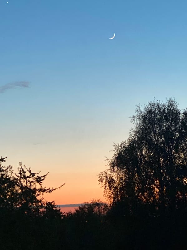 Crescent moon observed during twilight over Novokuznetsk, Russia
