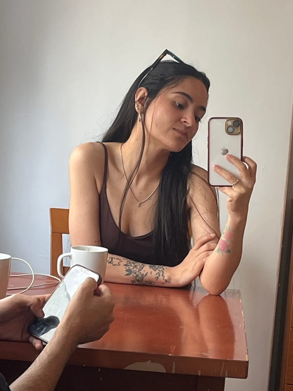 Woman Takes Mirror Selfie at A Coruña Home