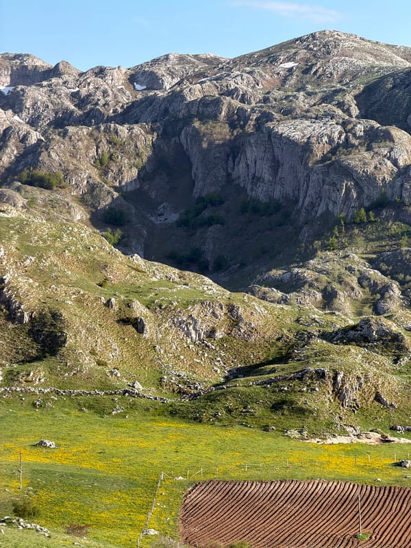 Mountain landscape with cultivated field documented in Boričje, Montenegro