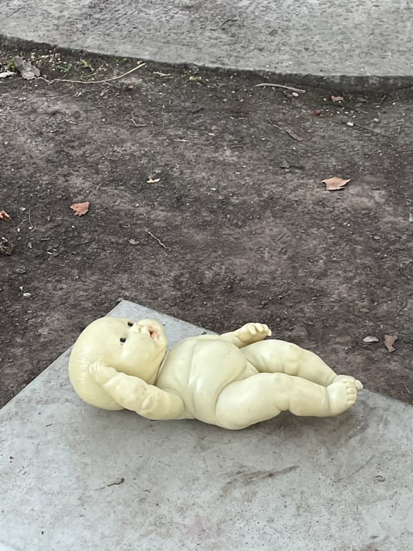 Abandoned baby doll found upside down in Olivos, Argentina