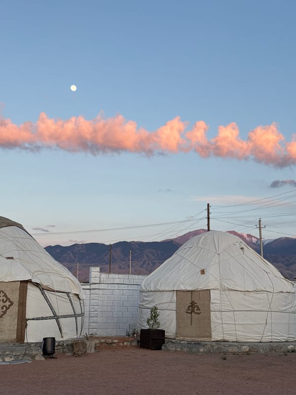 Traditional yurts spotted in mountainous Tong, Kyrgyzstan