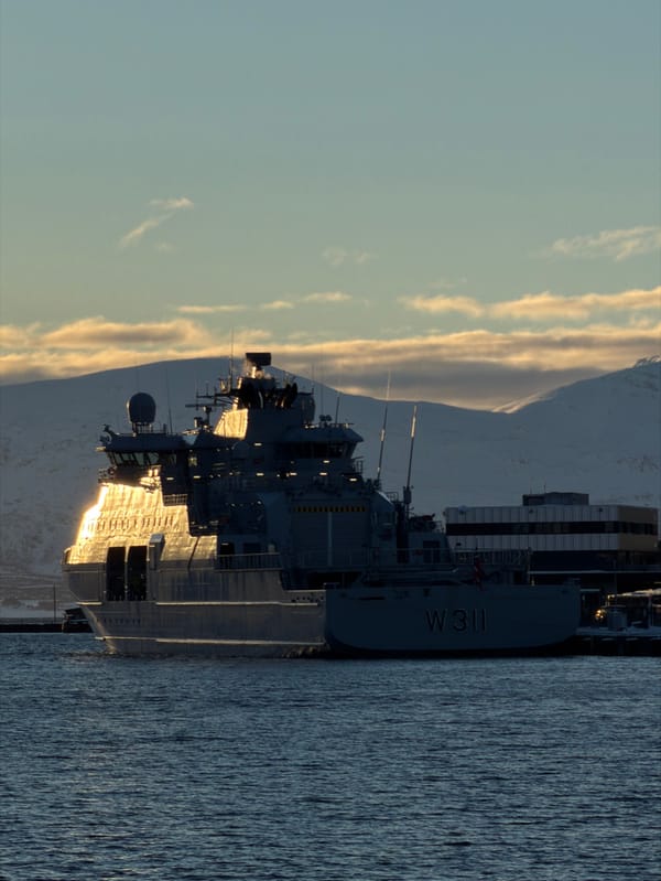 Winter scenes documented around Tromsø harbor and bridge