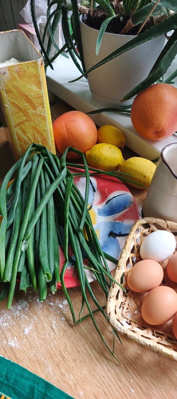 Home kitchen cooking session with scattered unrelated street scenes