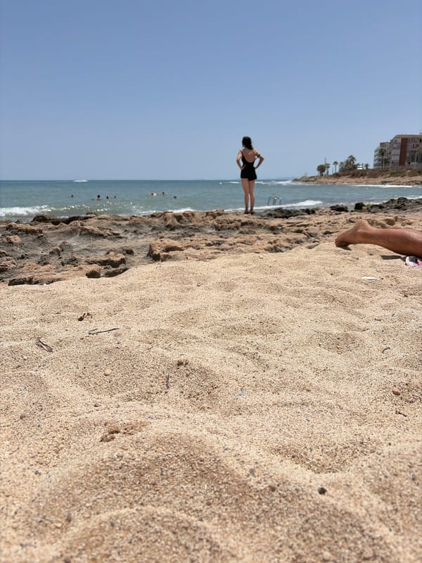 Sunny afternoon at Torrevieja's rocky Mediterranean shoreline