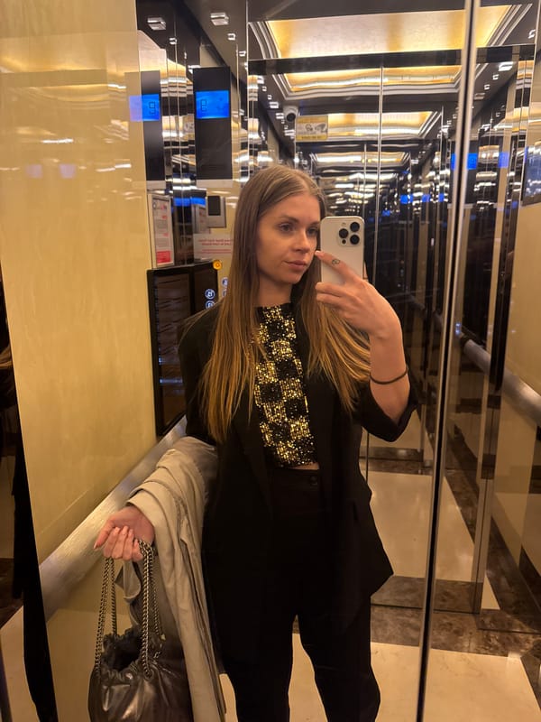 Woman takes elevator selfie in Batumi, Georgia