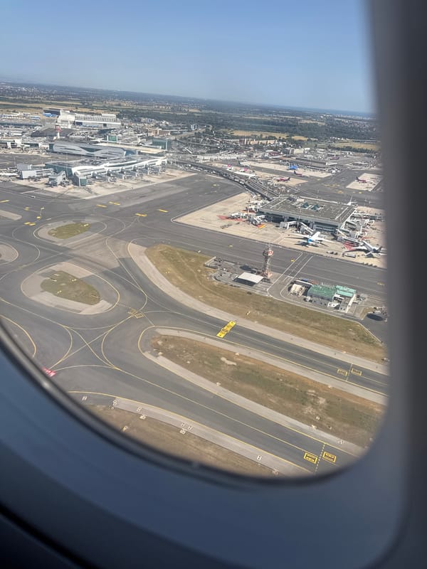 Passenger captures aerial views of Rome's Fiumicino Airport from plane
