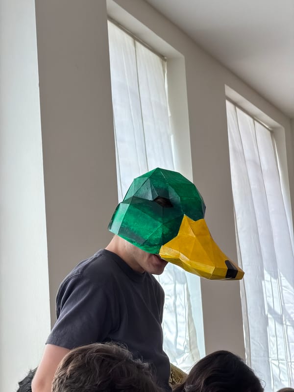 Milan design gathering with duck mascot and architecture materials