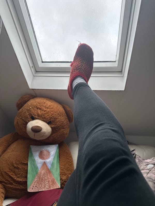 Woman documents rainy afternoon at home in Reading