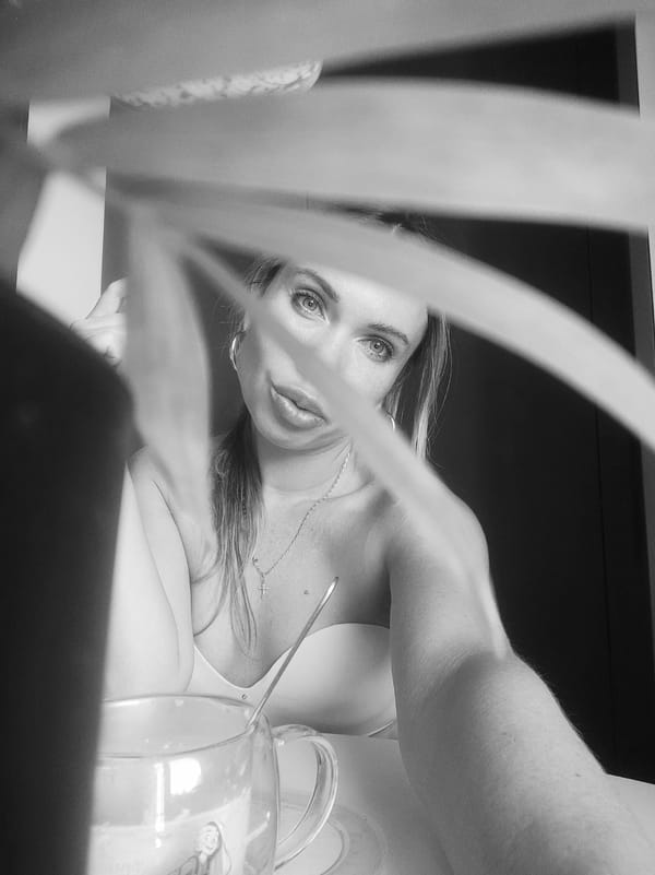 Woman photographed in dual portraits at Votkinsk cafe