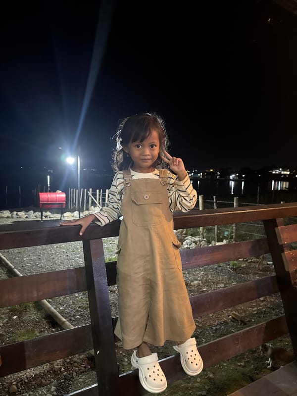 Nighttime hangout and phones in Kalalengkio, Indonesia