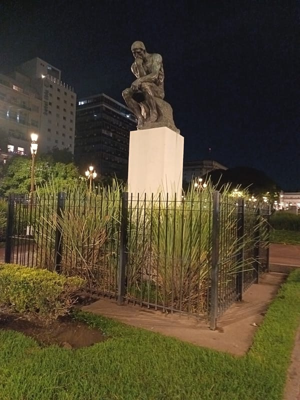 Rodin's 'The Thinker' sculpture photographed at night in Buenos Aires