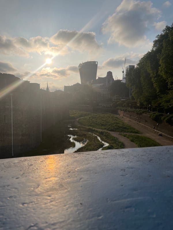 London landmarks observed during evening hours near Tower Bridge