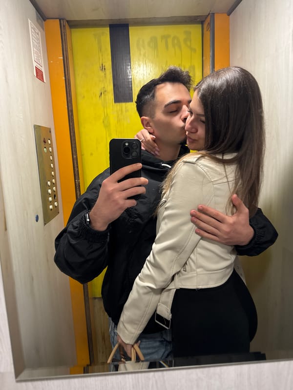 Couple Takes Mirror Selfie in Sofia Elevator