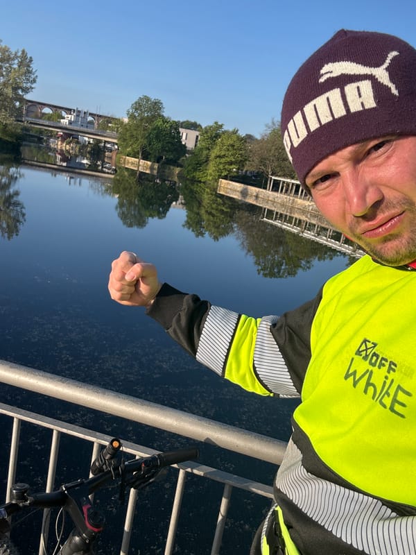 Man takes waterside selfie in Bietigheim-Bissingen on sunny morning