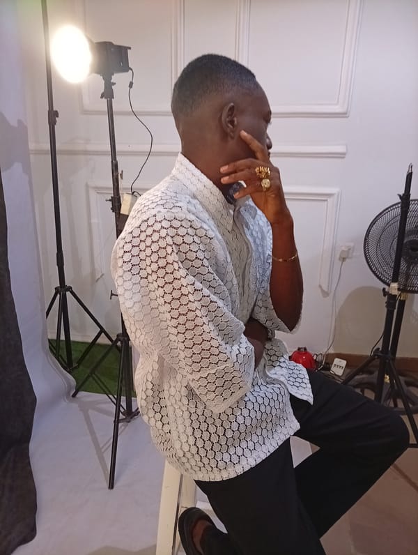 Man poses for professional photography session in studio