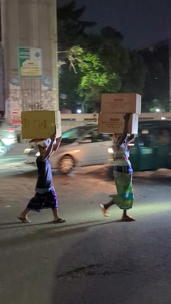 Workers conduct nighttime construction, maintenance tasks in Dhaka