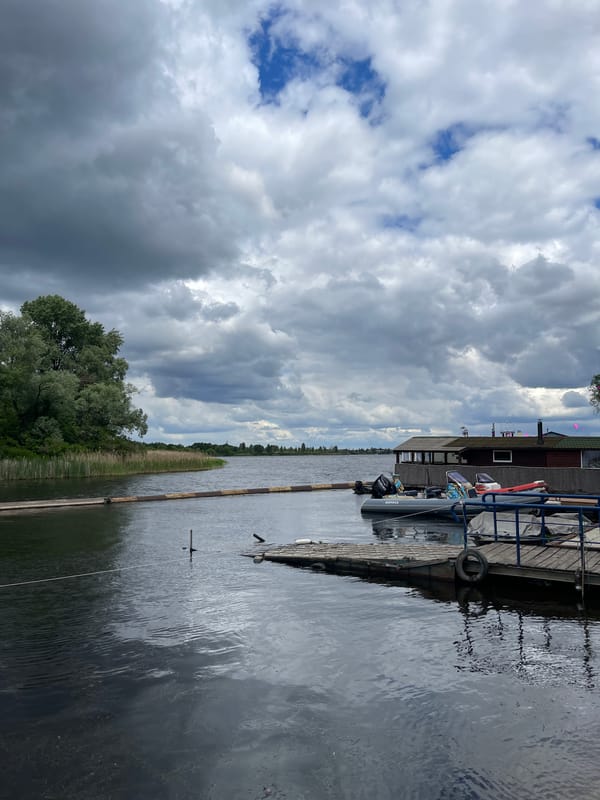 Boat moored at wooden dock near Vishen'ki, Ukraine