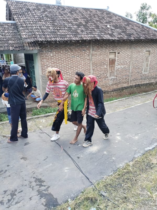 Early morning gathering documented outside residential building