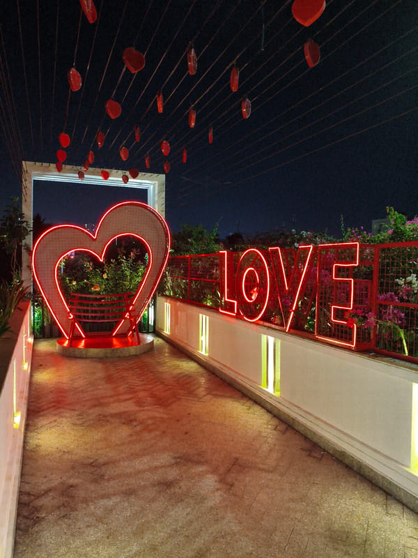 Red neon and heart decor light up a Nha Trang night venue