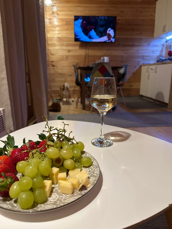 Indoor dining scene with grapes captured in Montenegro