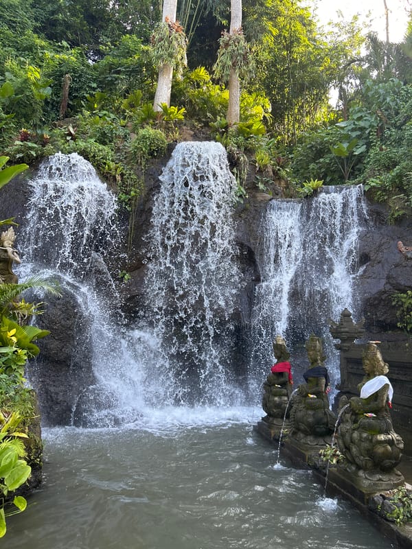 Traditional shrine statues documented at Sukawati waterfall, Indonesia