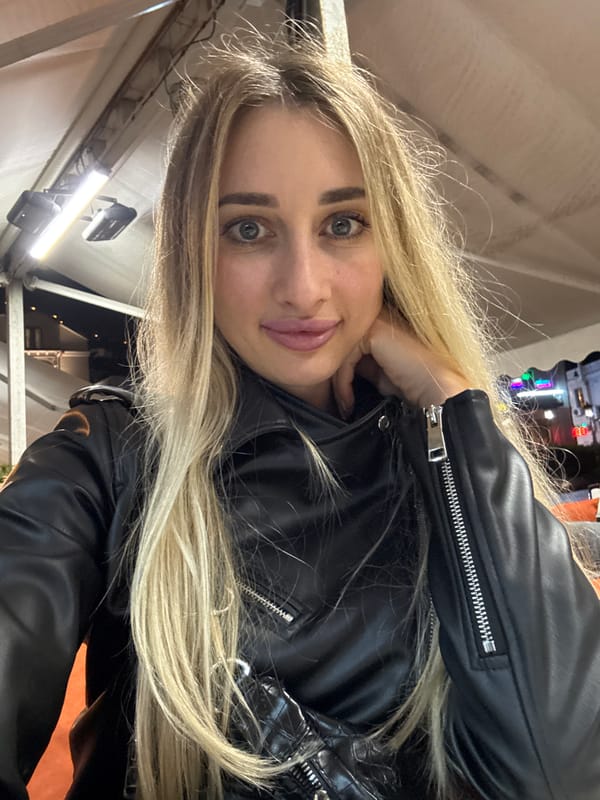 Woman takes selfie at indoor venue in Tbilisi