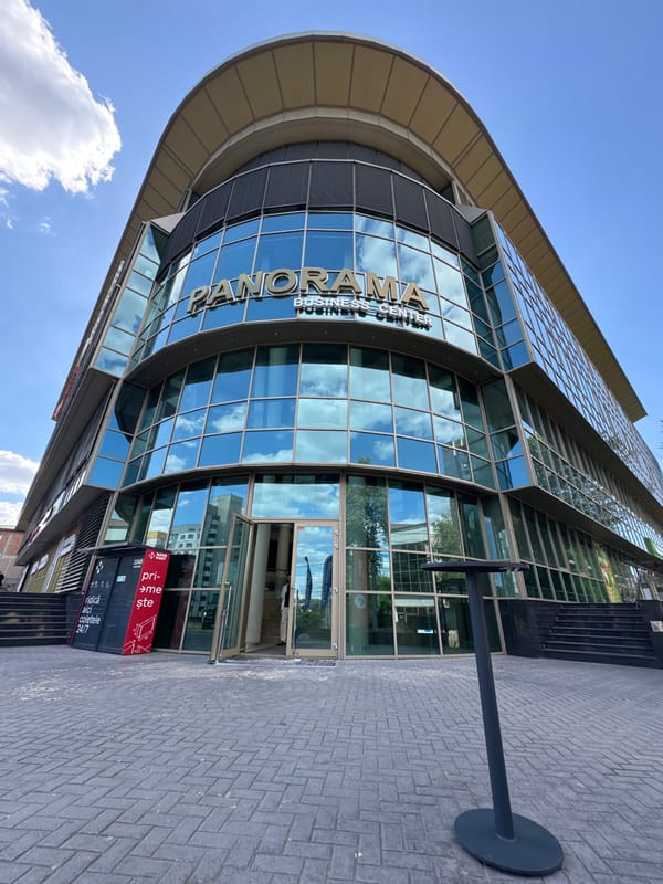 Panorama Business Center's curved glass facade in Chișinău