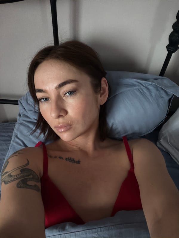 Woman resting on bed observed in Ust-Ilimsk
