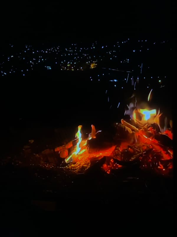Late-night bonfire gathering documented in Tinaquillo, Venezuela