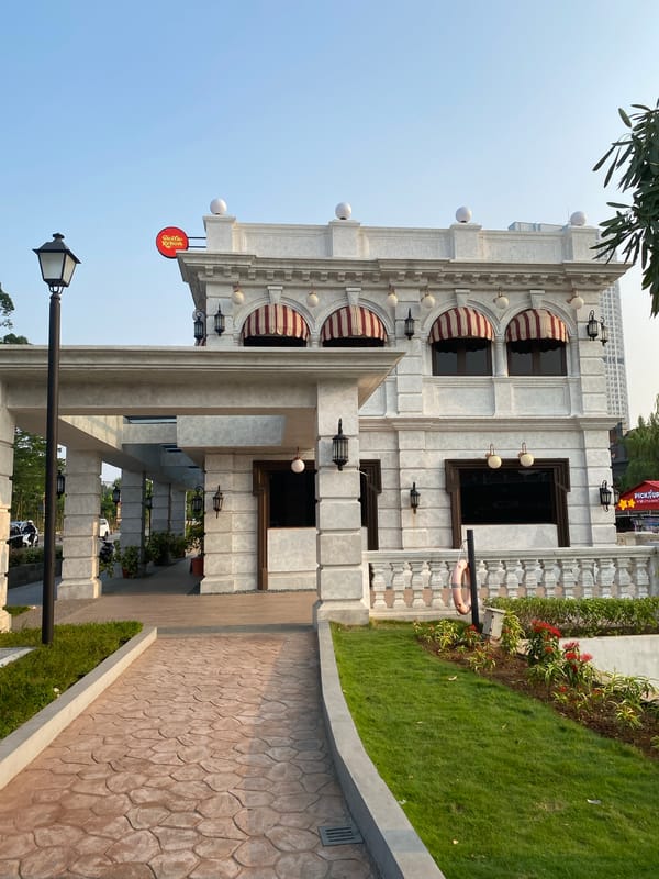 Morning walk through Grand Waterfront's canals, gardens, and commercial strip