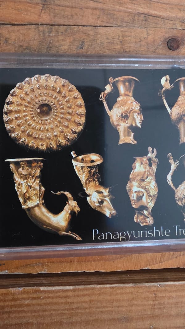 Tourist photographs ancient Bulgarian gold treasure postcards in Blagoevgrad