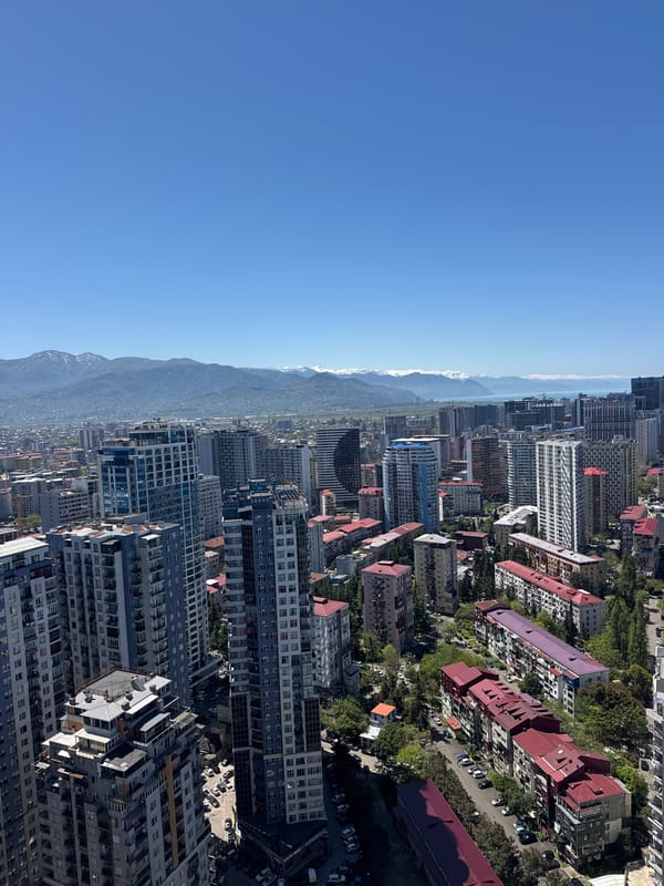 Aerial views capture Batumi's coastal cityscape and mountains
