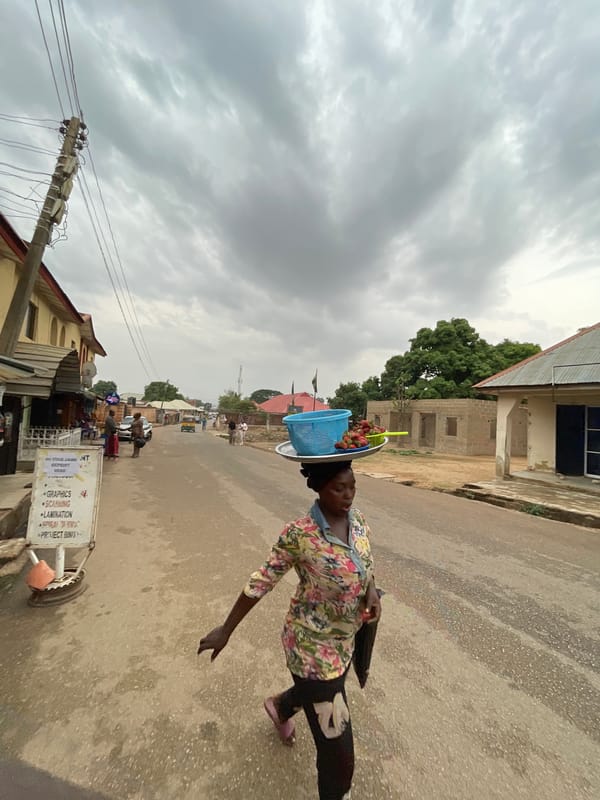 Daily street life documented across Jos, Nigeria neighborhood