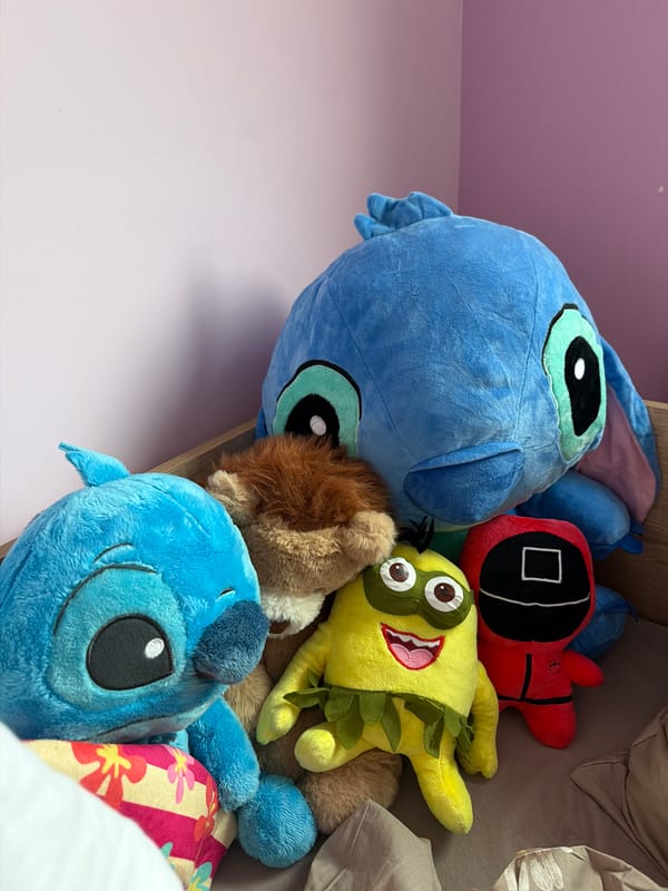 Stuffed animals arranged in bedroom in Etropole, Bulgaria