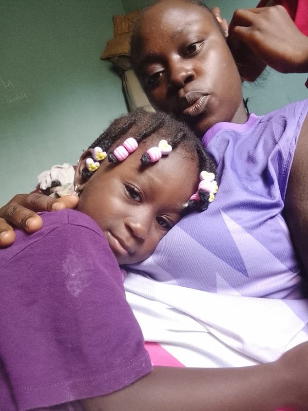 Mother and child share quiet indoor moments