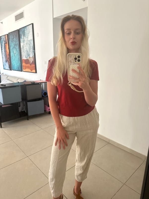 Mirror selfie and hallway shot inside a Petah Tikva apartment