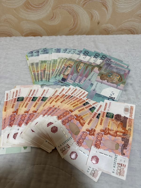Currency and luxury items displayed in rural Belarus