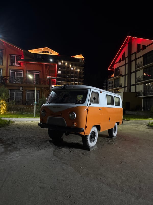 Illuminated resort district captured at night in Syrostan, Russia