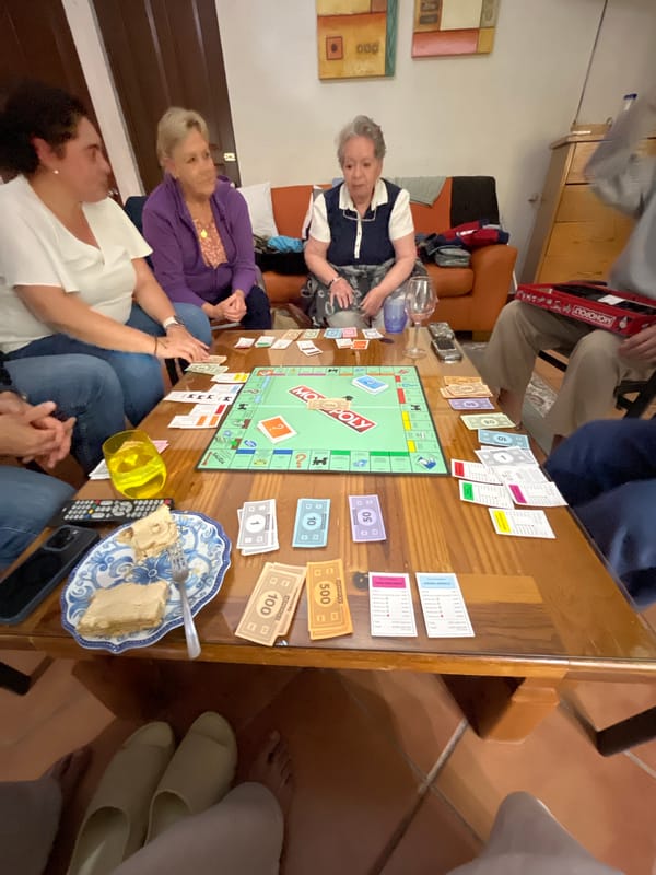 Family Monopoly game night captured in Puebla