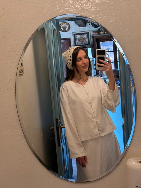 Woman Takes Mirror Selfie in White Outfit, Serbia