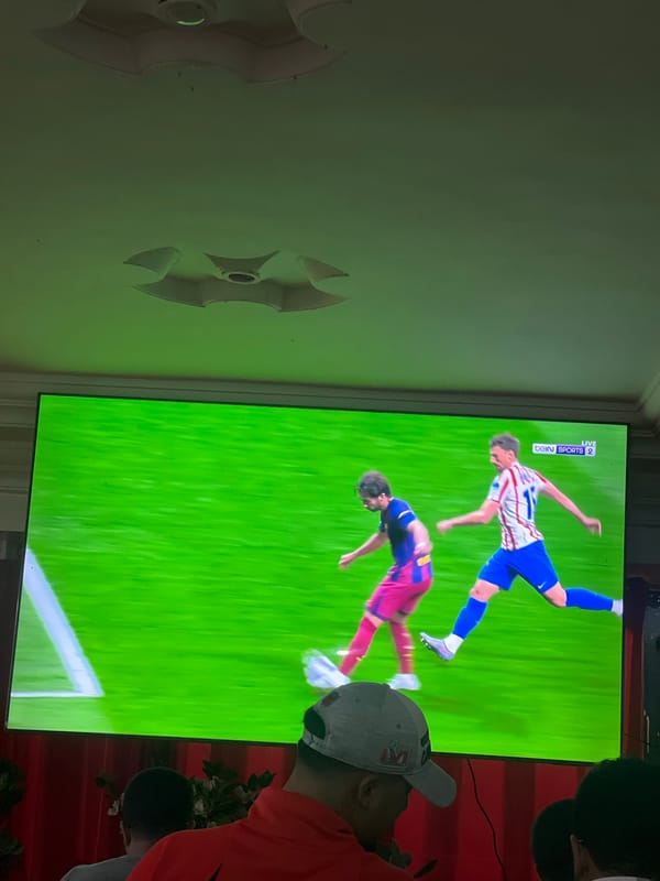 Evening leisure time: soccer viewing and pool game in Morocco