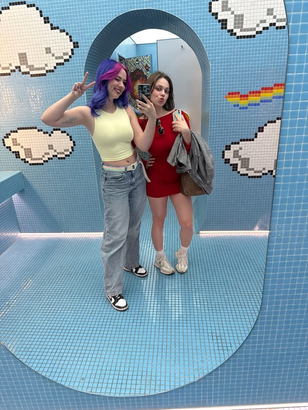 Colorful-haired tourist documents Budapest candy shop crawl with selfies