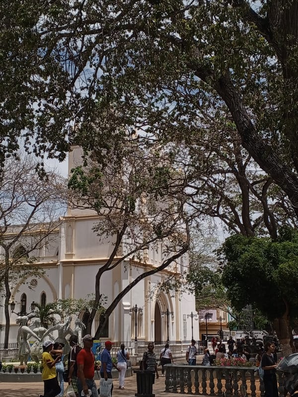Daily life unfolds in Porlamar's central plaza