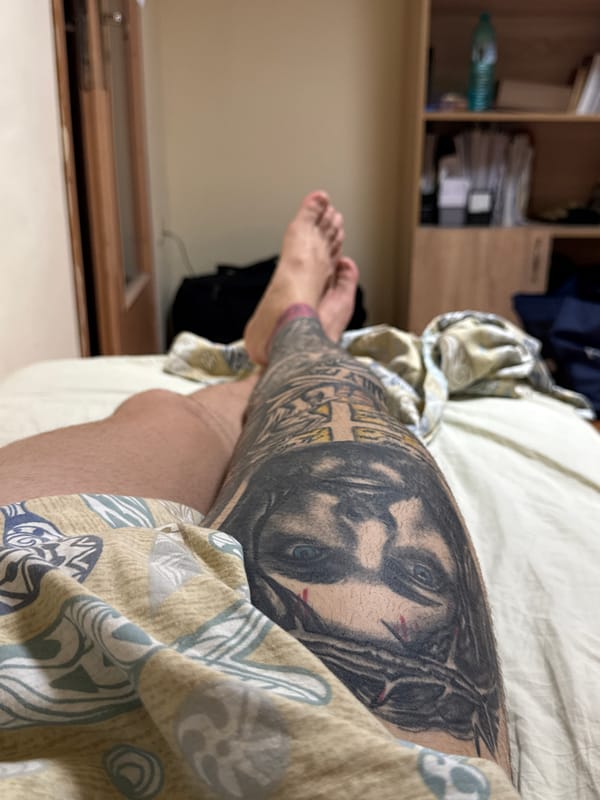 Religious tattoo with crown of thorns captured in close-up