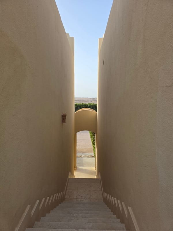 Egyptian archway architecture documented in alley and interior views