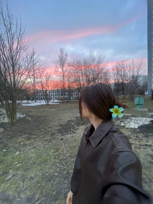 Woman Takes Twilight Selfies in Moscow Residential District